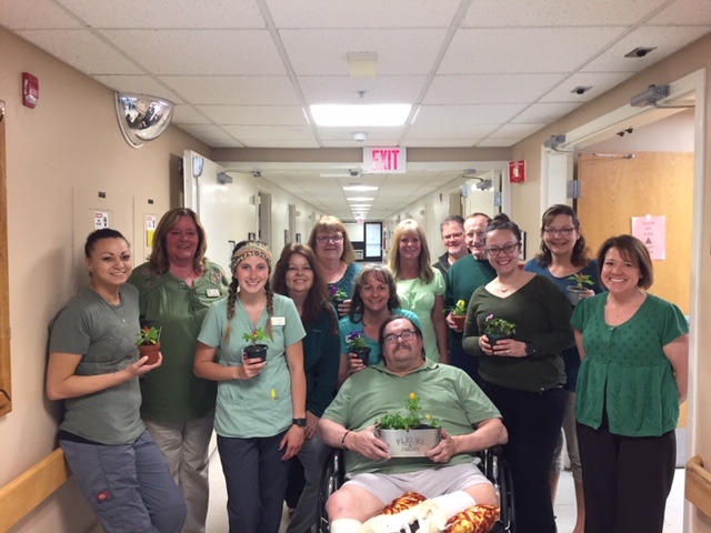 medilodge of green view staff wearing green